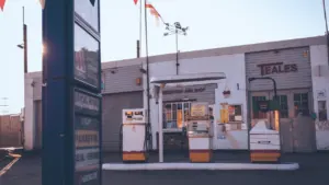 Vintage style petrol pumps at a local service station in Leeds, United Kingdom.